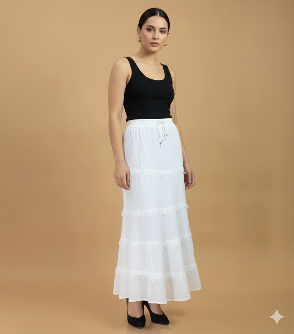 White cotton fringe tier maxi skirt front view with tiered design and drawstring waist