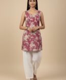 Model wearing pink paisley sleeveless cotton kurti, front view — minimal fall fashion style.