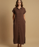 Woman wearing a brown cotton double gauze button-down dress styled for fall fashion, featuring short sleeves, pockets, and a minimal chic neutral look.