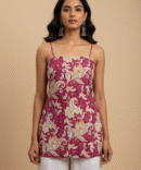 model wearing pink paisley printed , lace up back top